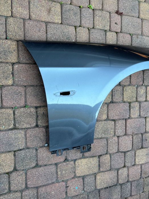 Błotnik prawy przód BMW e92 oryginał.