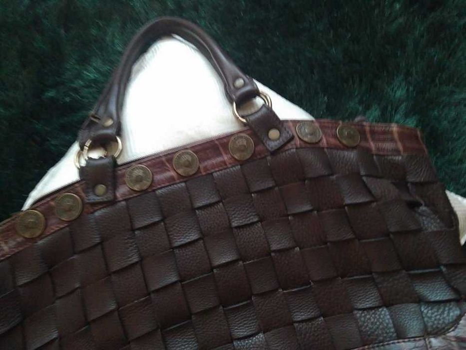 Bolsa castanha em pele