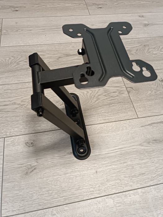 Кріплення для телевізора з поворотом