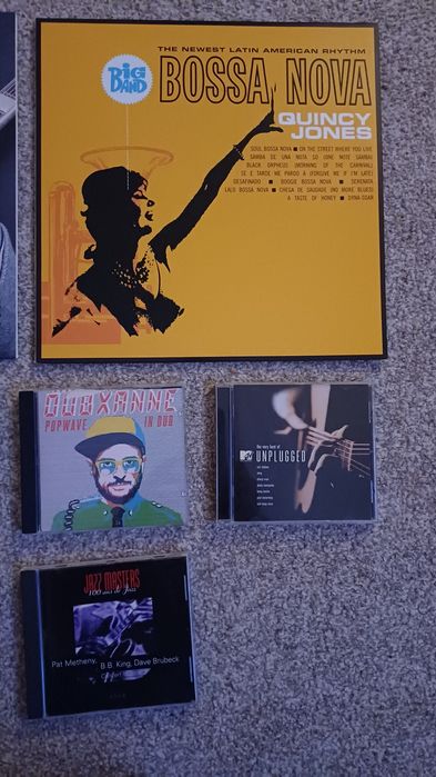 Discos de vinil e CD