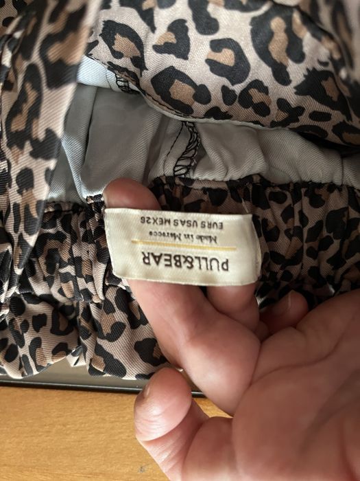 Calças padrão leopardo