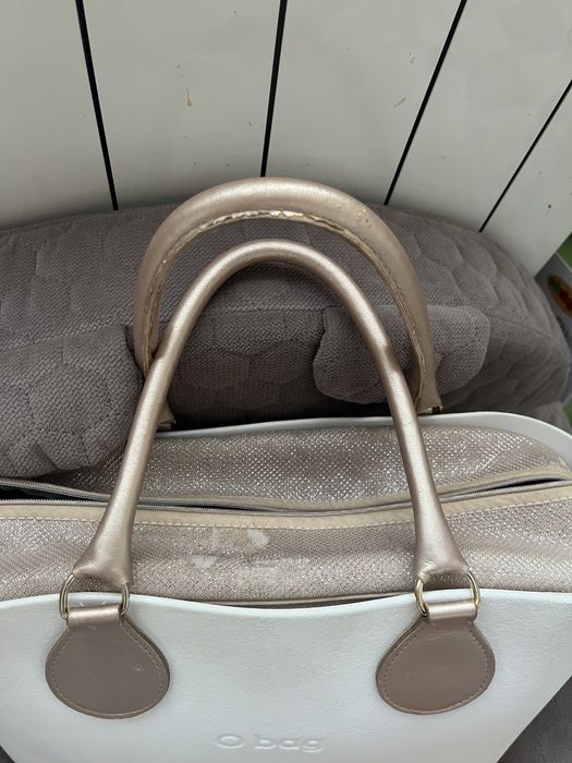 OBAG szampańskie złote uchwyty micro tubolare i organizer Nomi mini