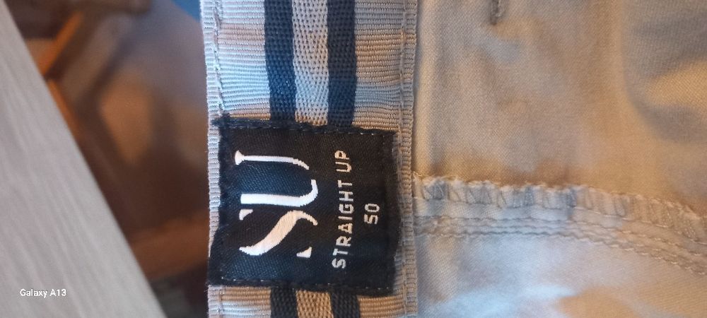 Firmowe spodnie męskie. Szare