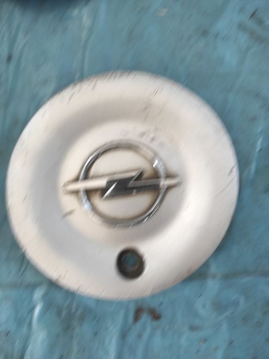 Dekieleki Kapseli Kołpaki do felg aluminiowych OPEL