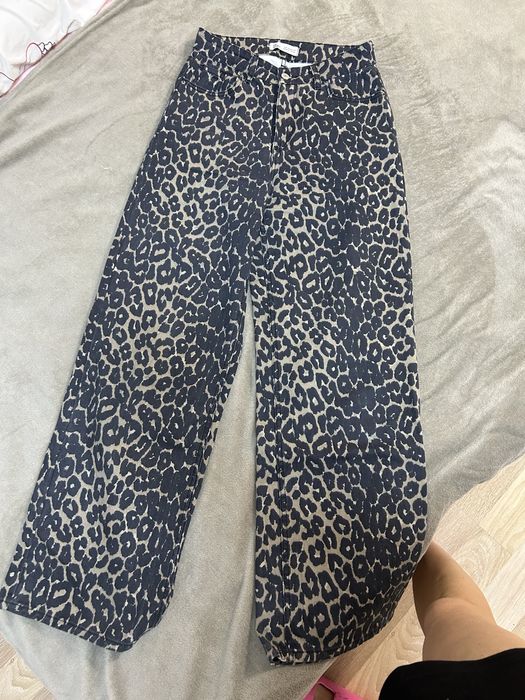 Леопардові джинси штани