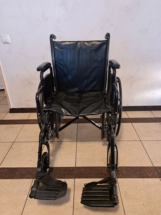 Коляска для людей з особливими потребами