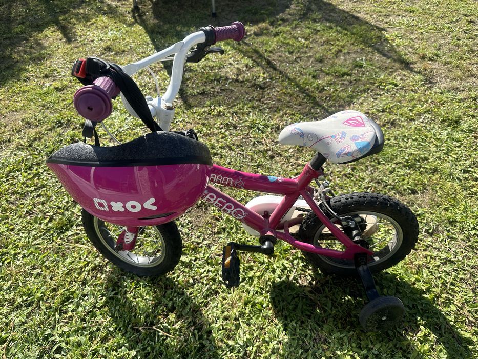 Bicicleta crianca com rodas laterais