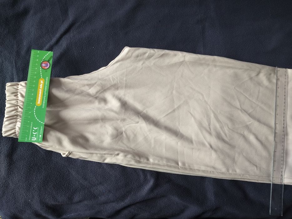 Spodnie młodzieżowe letnie beżowe 158  typu wide leg