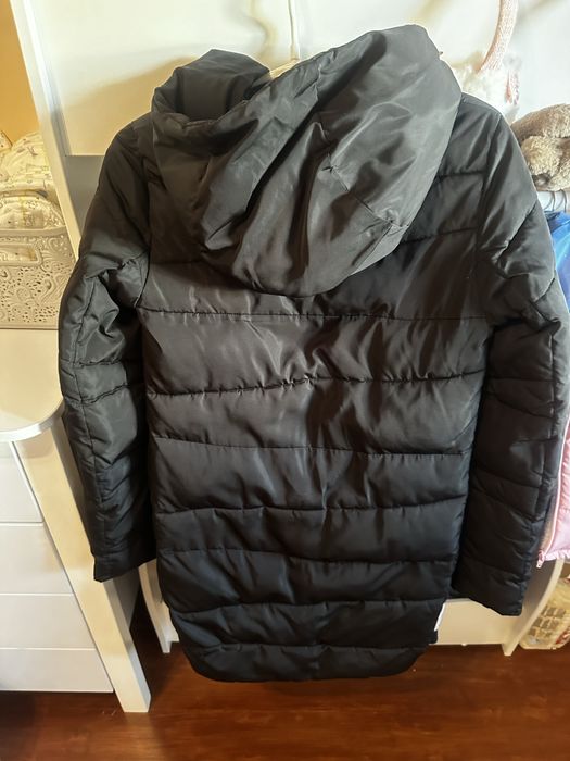 Пуховик нв дівчину