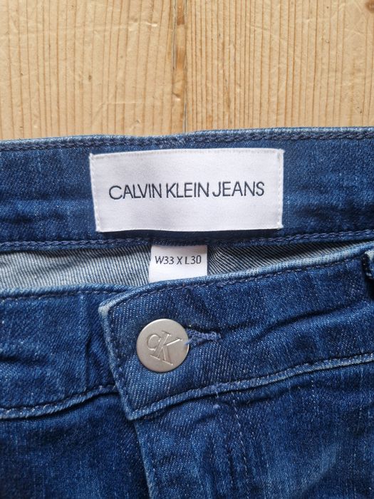 Jeansy spodnie klasyczne Calvin Klein L/XL 33/30