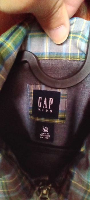 Casaco Gap 10 anos hoje 15