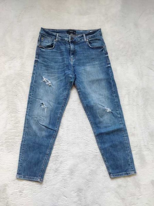 Spodnie jeansowe damskie Reserved. Rozmiar 40. Dziury przetarcia