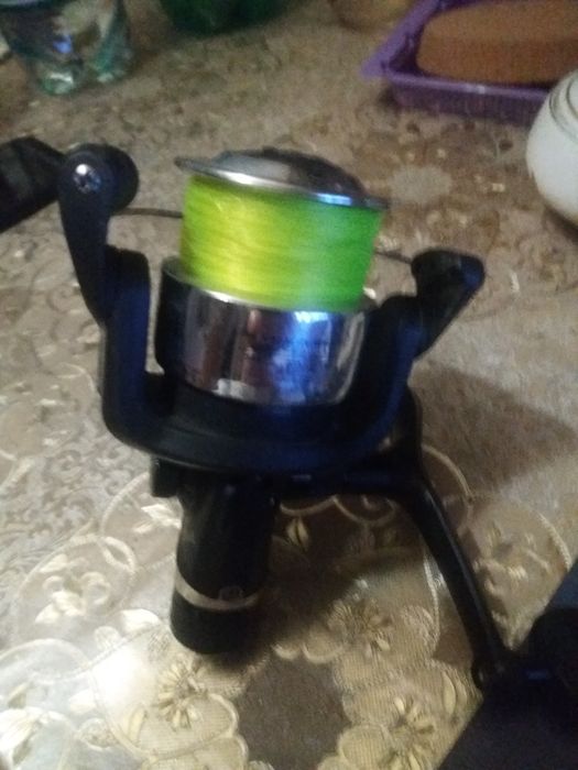 Kołowrotek Strike i wędkę Robinson