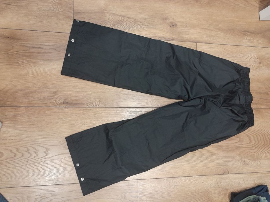 Spodnie przeciwdeszczowe 122/128