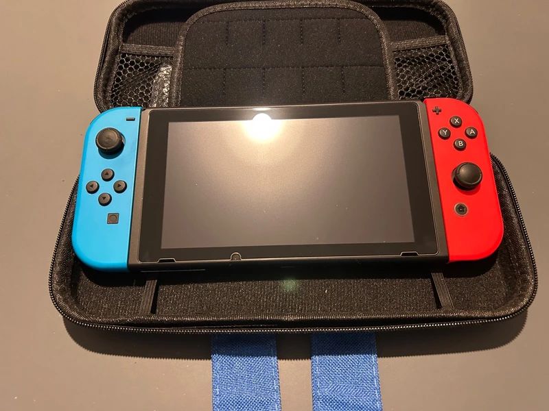 Nintendo Switch Neon Vermelho Azul com Dock, Capa e 3 Jogos