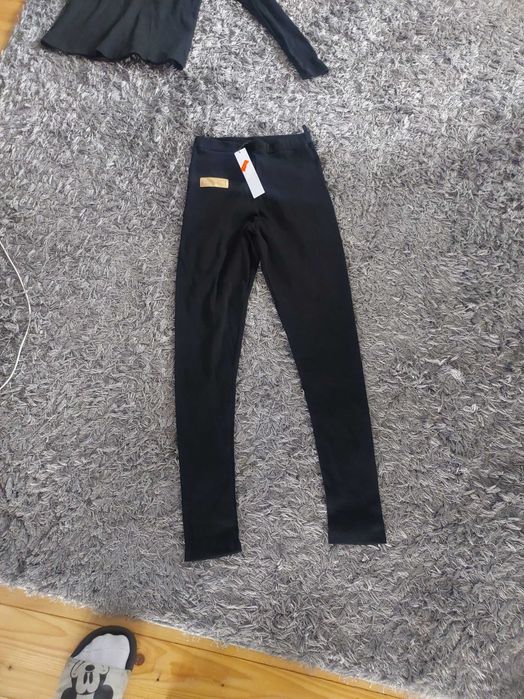 Nowe legginsy czarne Laki prążek