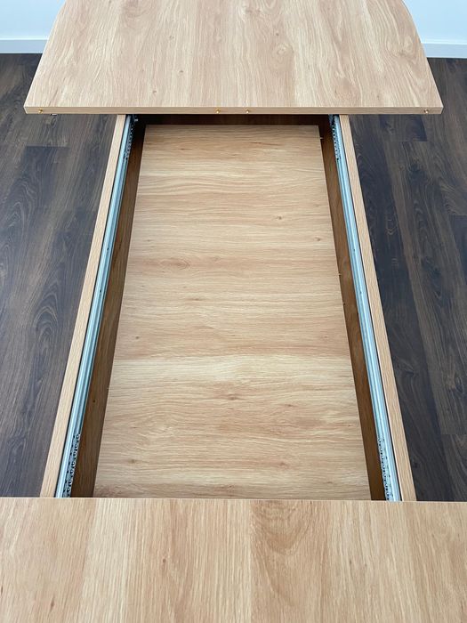 Mesa de jantar oval extensível