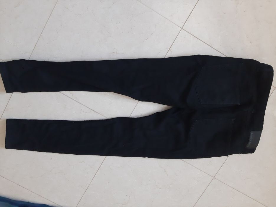 Calças pretas homem