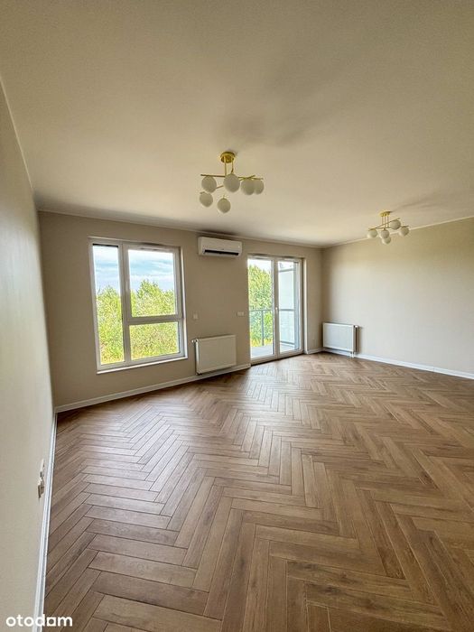 Nowoczesne mieszkanie z balkonem, garażem i klimatyzacją