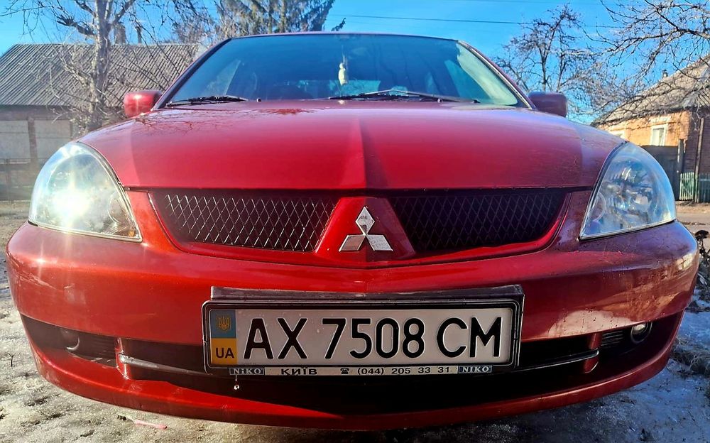Мицубиси лансер.