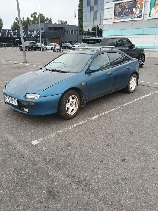 Мазда 323 F BA .