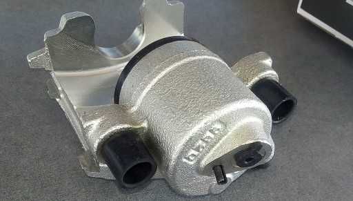 Pinça de travão nova VW/AUDI, eixo dianteiro, lado esquerdo + direito