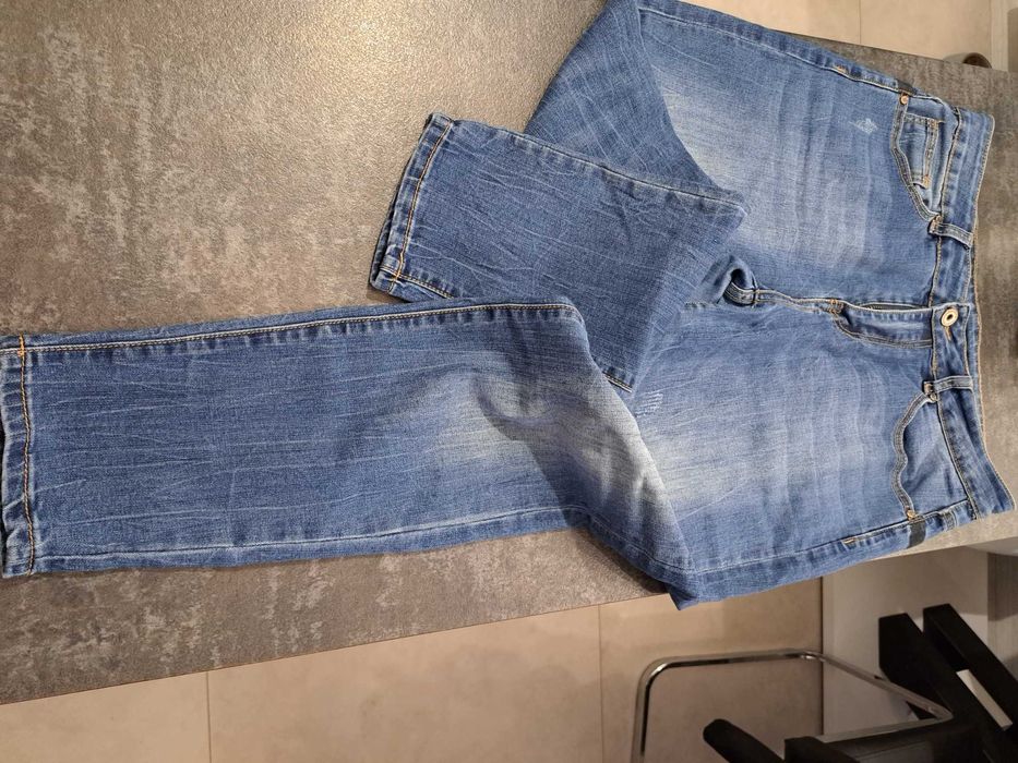 Spodnie jeans niebieskie rozm L/ 44