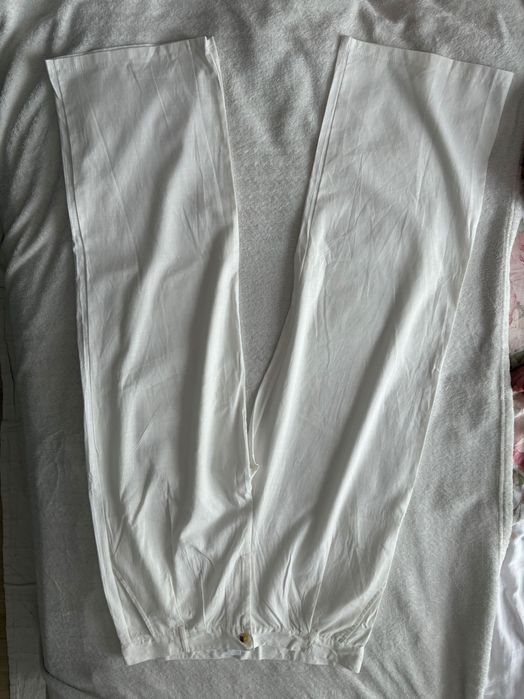 Białe świetne spodnie prosta nogawka L XL 40 len bawełna