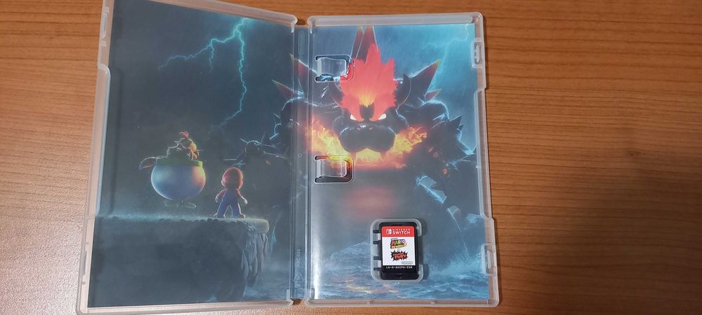 Nintendo Switch Lite 32GB cinzento escuro, usada, com 2 jogos