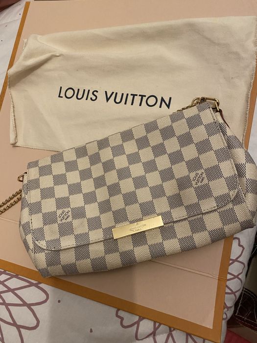 Louis vuitton - pochet com alça em fio dourada