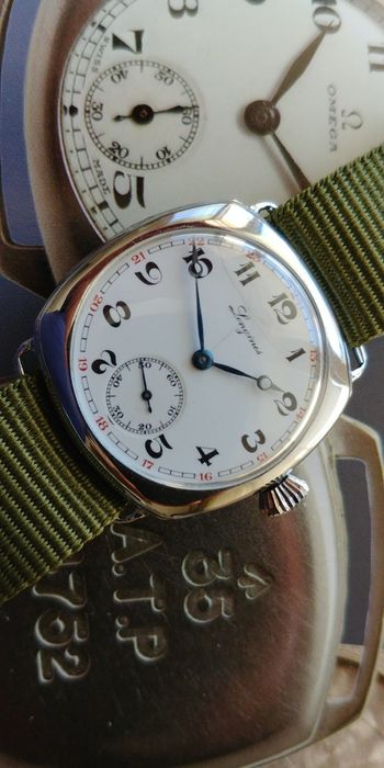 Longines 1936 historia katalogi Omega IWC Zenith Ulysse Jaeger Tissot