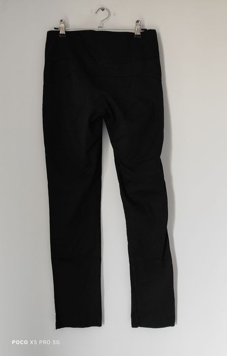 Czarne eleganckie spodnie damskie z zamkami XS