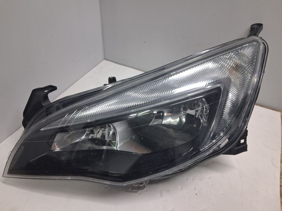 Lampa Opel Astra J 4 IV Zwykła Lewa 1EG010011-61