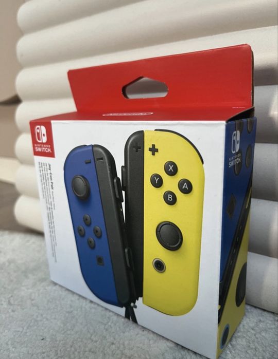 Joy con do Nintendo switch żółto niebieski