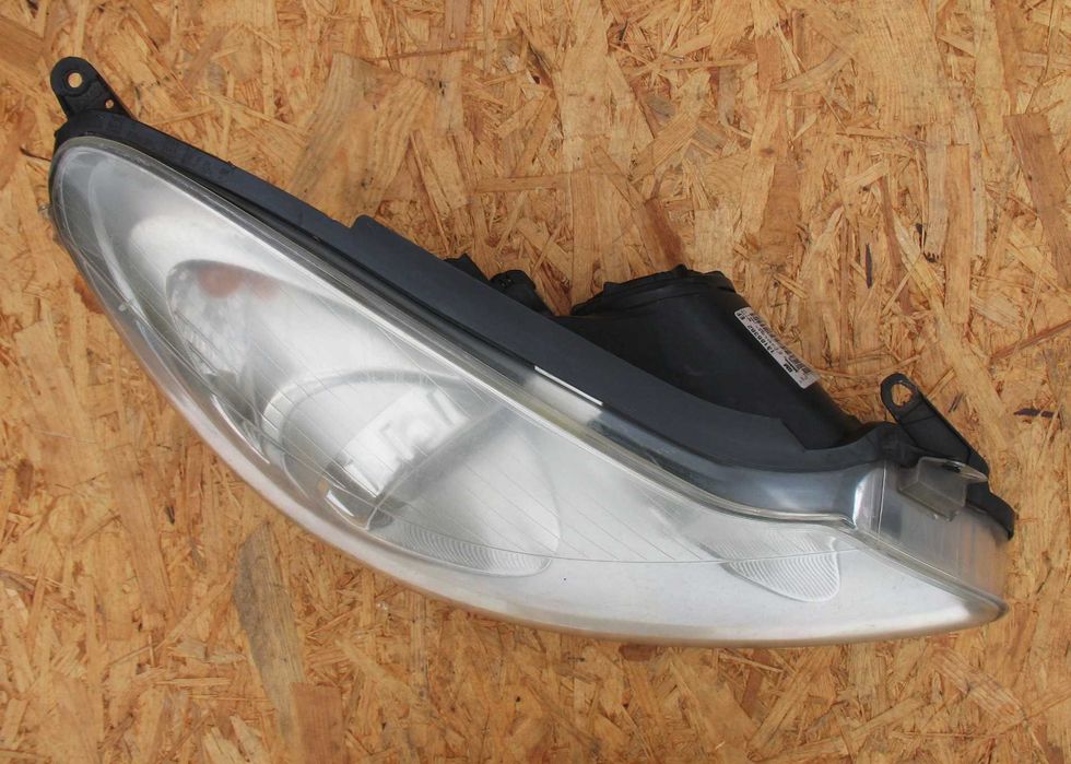 Opel Corsa D lampa prawa przód Oryginał EU opis