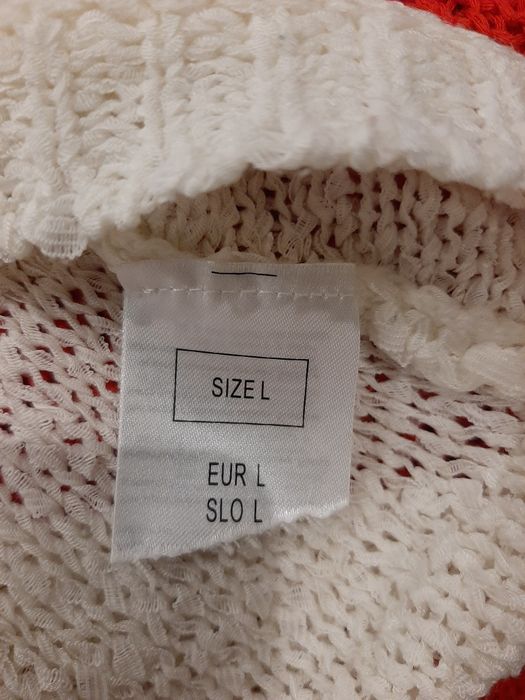 Sweterek ażurowy Orsay