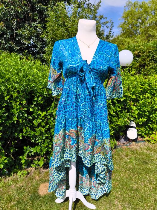 Sukienka niebieska z jedwabiu z trenem gołymi plecami roz M-L