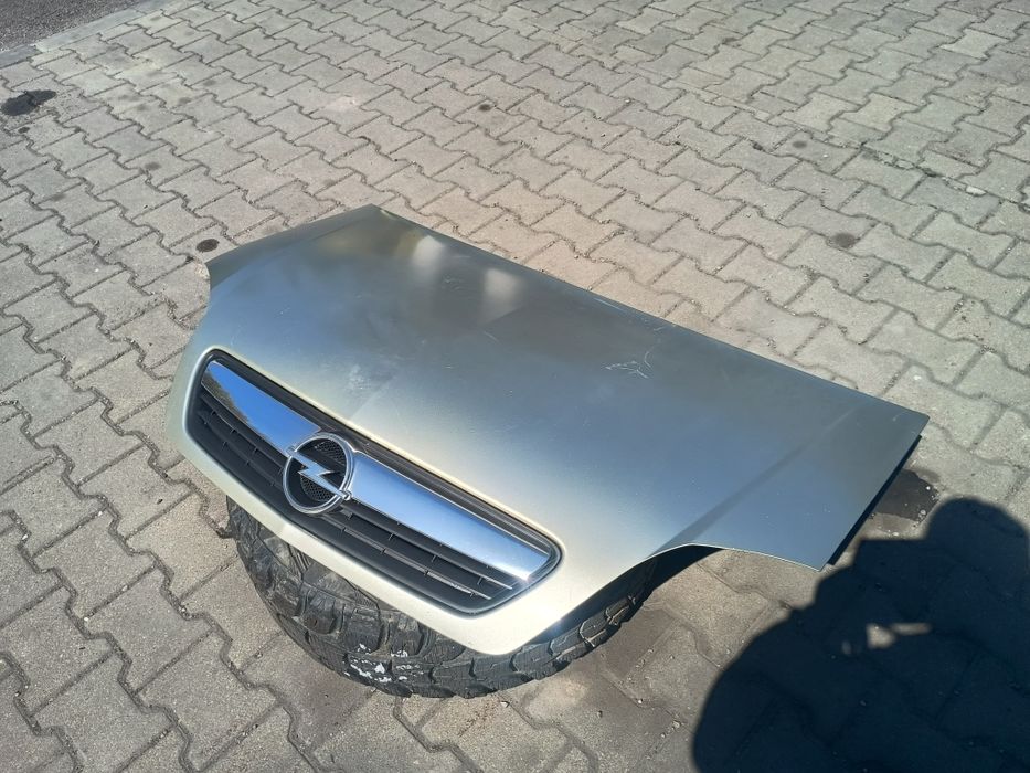 Opel Meriva maska pokrywa silnika lift