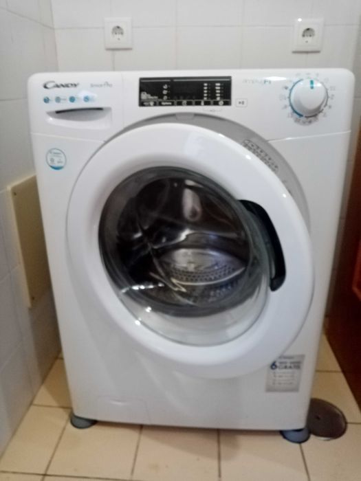 Máquina de lavar roupa como nova