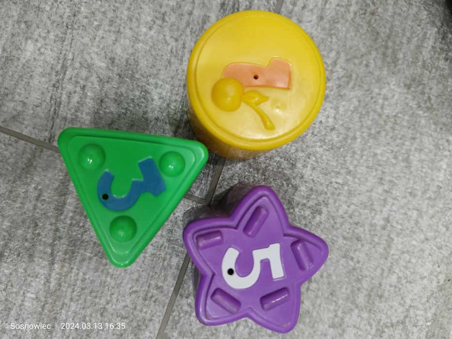 Sprzedam Garnuszek na klocuszek FISHER PRICE.