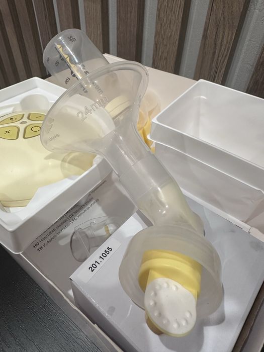 Молоковідсмоктувач Medela swing + calma