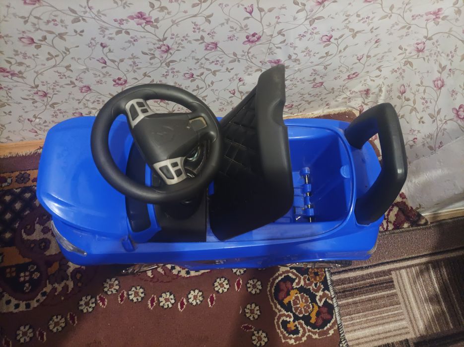 Дитяча машина каталка