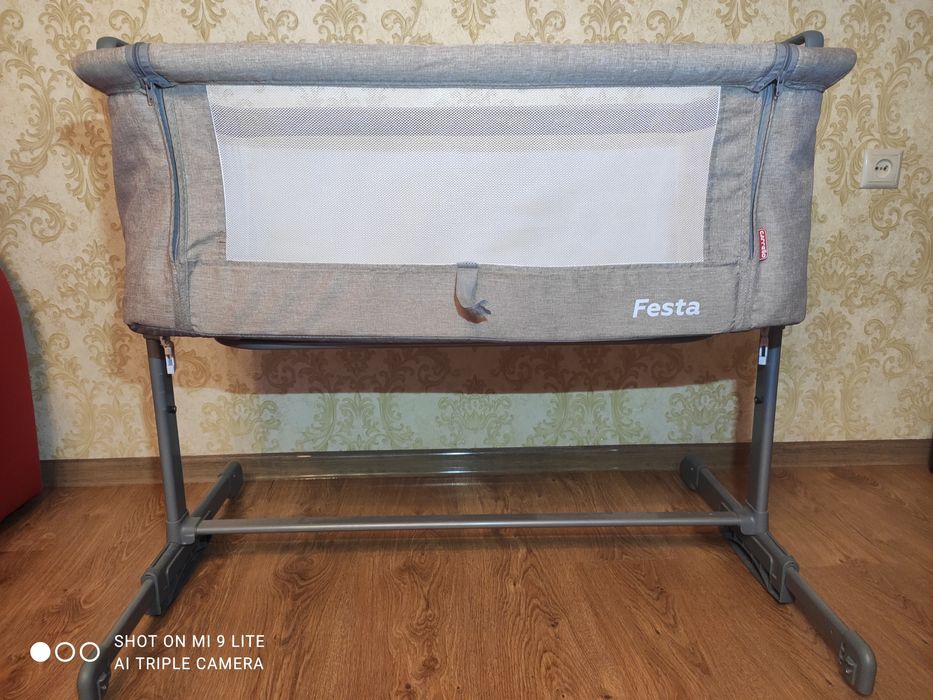 Приставне ліжечко для немовлят