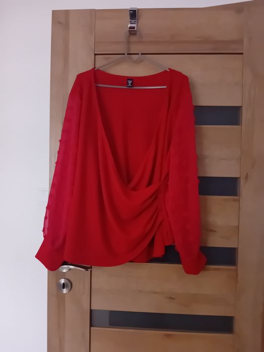 Śliczny sweterek 46/48