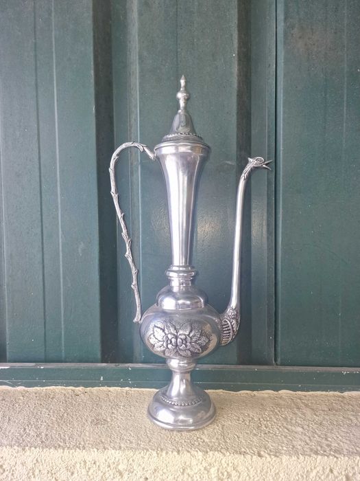 Peça antiga de estanho