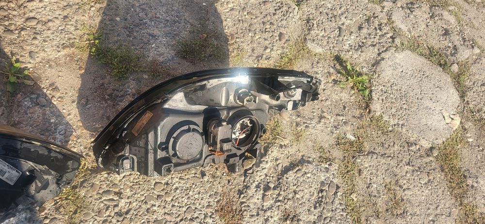 Renault  Scenic RX 4 Lampa Lewa  lub Prawa  zderzak maska błotnik Pas