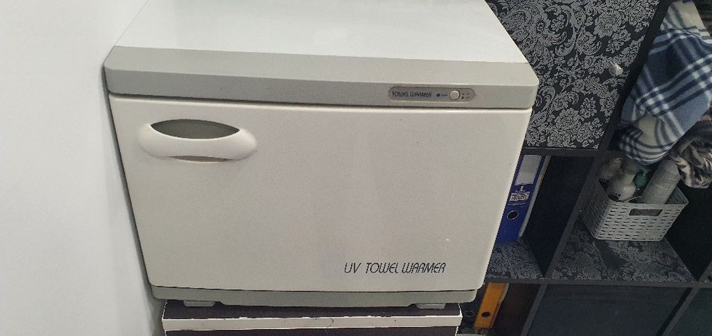 Esterilizador e aquecedor de toalhas