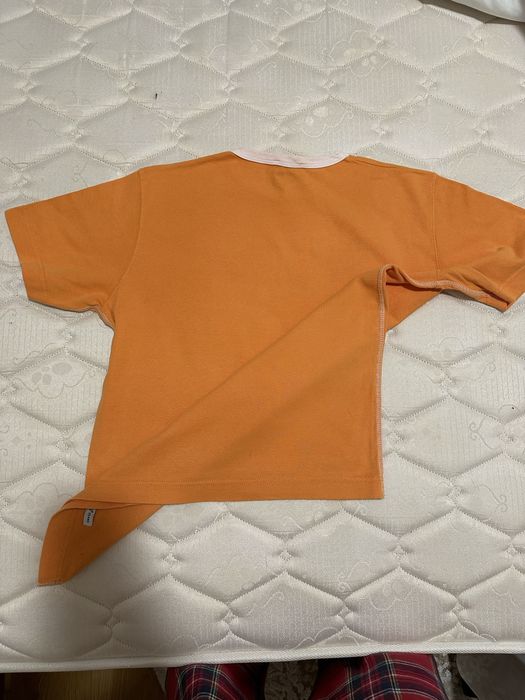 T-shirt laranja da marca polaca H.I.S Jeans.