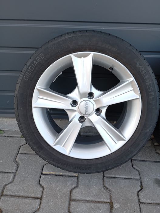 Komplet kół Opel Corsa 195/50/15 4x100 Letnie felgi Trinity