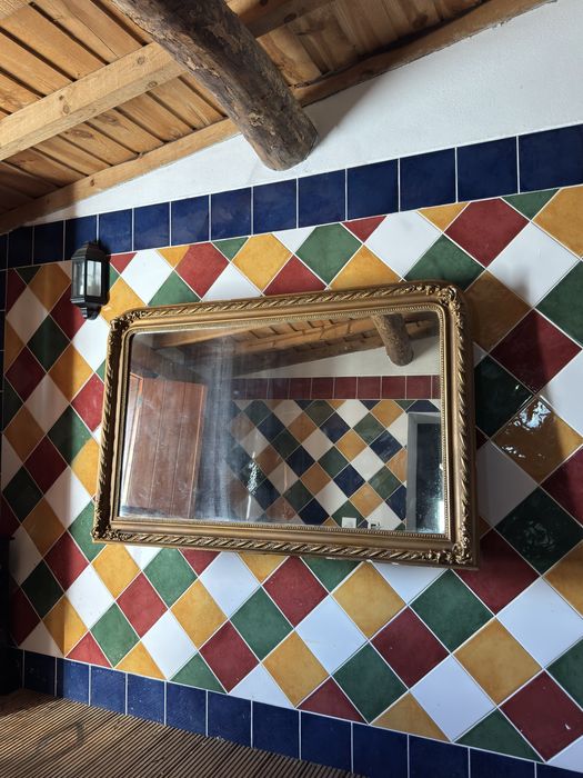 Antigo espelho dourado